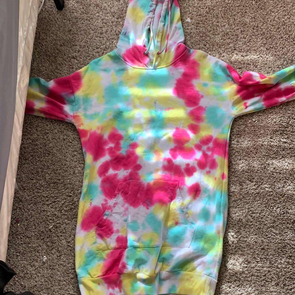 A tie dye dress or a sweater